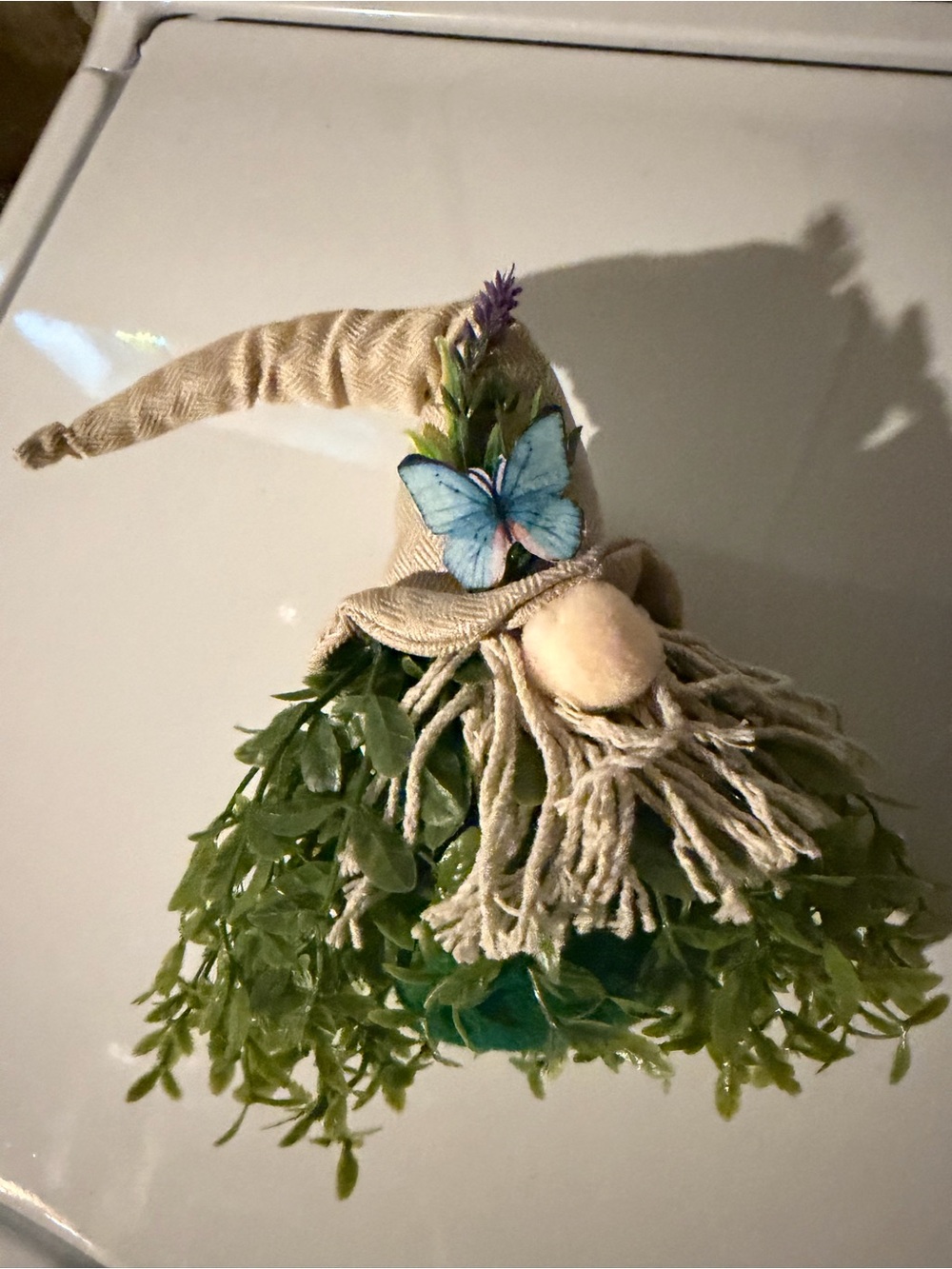 Artificial faux greenery garden gnome figurine